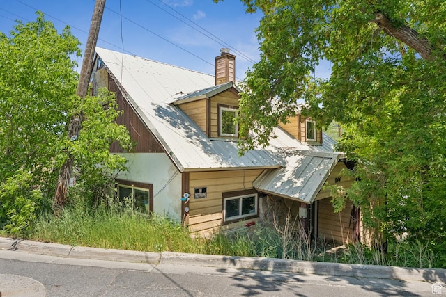 844 Empire Ave, Park City, UT 84060 - view of front of home featuring a metal roof and a chimney