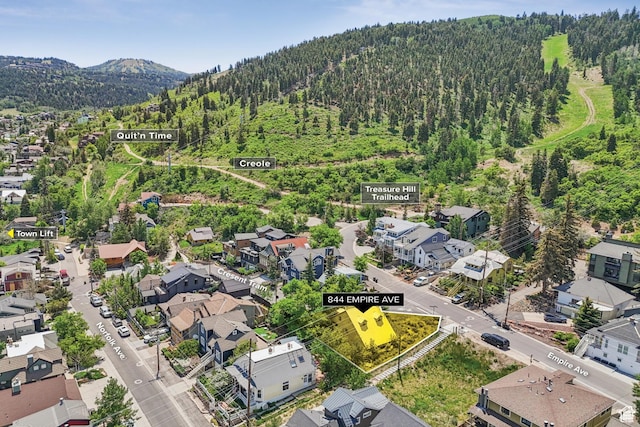 844 Empire Ave, Park City, UT 84060 - aerial perspective of suburban area with a heavily wooded area and mountains