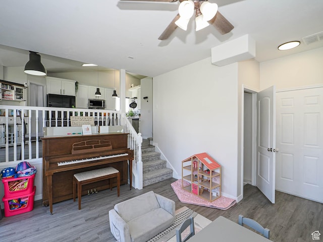 4242 W 11430 S, South Jordan, UT 84009 - living area featuring wood finished floors and a ceiling fan