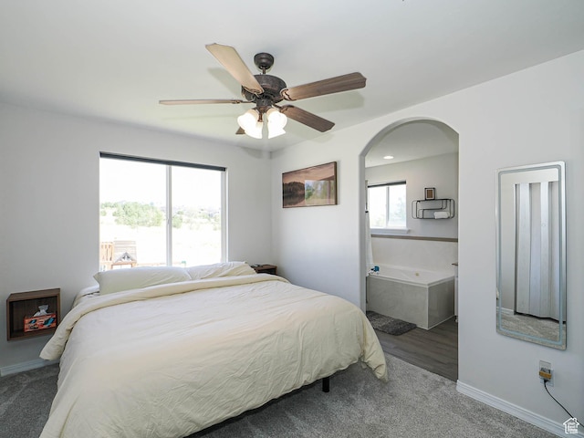 4242 W 11430 S, South Jordan, UT 84009 - carpeted bedroom featuring ceiling fan and arched walkways