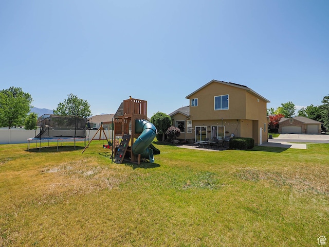 4242 W 11430 S, South Jordan, UT 84009 - view of yard featuring a trampoline and a playground