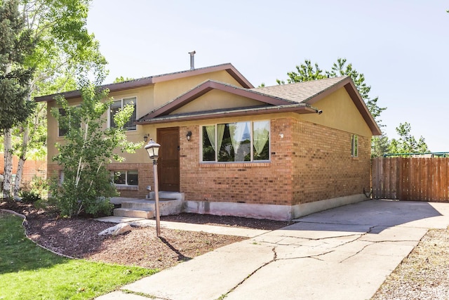 2039 W Camelot S, West Jordan, UT 84084 - view of front of property featuring brick siding and driveway