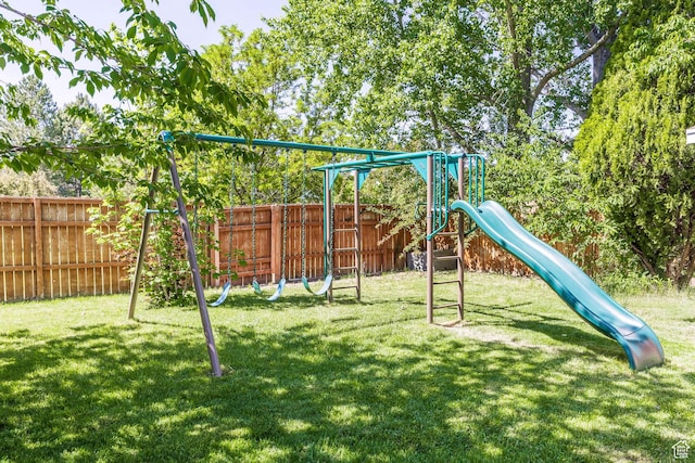 2039 W Camelot S, West Jordan, UT 84084 - view of play area featuring a fenced backyard