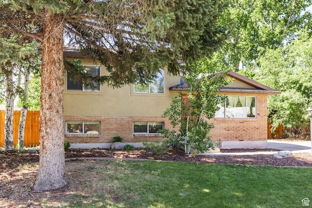 2039 W Camelot S, West Jordan, UT 84084 - view of front of house featuring brick siding and stucco siding