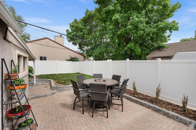 3175 S Imperial St, Millcreek, UT 84106 - fenced backyard featuring outdoor dining space and a patio