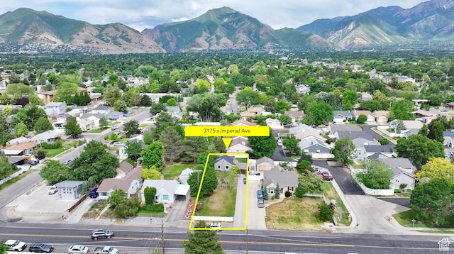 3175 S Imperial St, Millcreek, UT 84106 - aerial view of residential area featuring a mountainous background and property parcel outlined