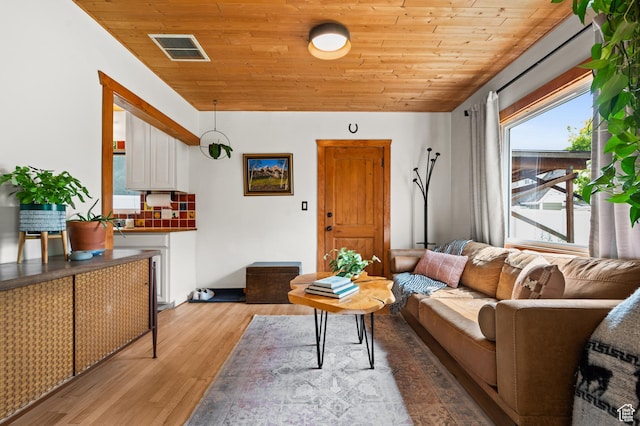 3175 S Imperial St, Millcreek, UT 84106 - living area featuring light wood-type flooring and wood ceiling