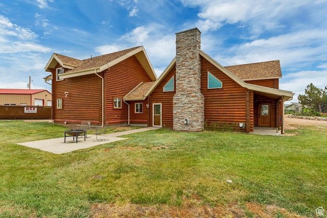 366 E Valley Dr S, Park City, UT 84098 - back of property featuring a fire pit, a patio area, a lawn, a chimney, and a shingled roof