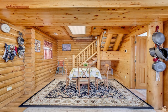 366 E Valley Dr S, Park City, UT 84098 - dining room with rustic walls, wood ceiling, stairs, and wood finished floors