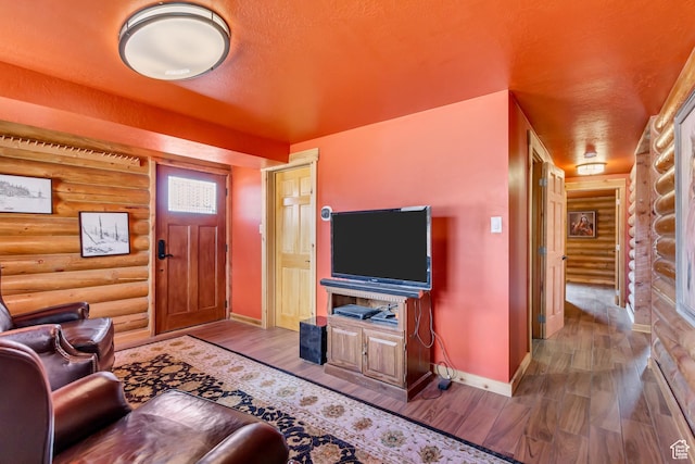 366 E Valley Dr S, Park City, UT 84098 - living room featuring rustic walls, wood finished floors, and a textured ceiling