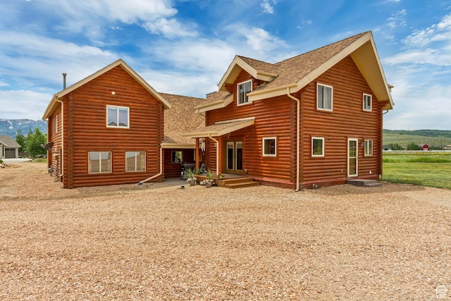 366 E Valley Dr S, Park City, UT 84098 - rear view of house with a shingled roof and a mountain view