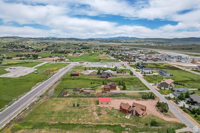 366 E Valley Dr S, Park City, UT 84098 - aerial overview of property's location with a mountain backdrop, property parcel outlined, and nearby suburban area