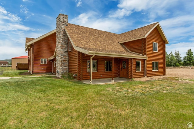 366 E Valley Dr S, Park City, UT 84098 - rear view of property featuring a shingled roof, log exterior, a patio, a yard, and a chimney