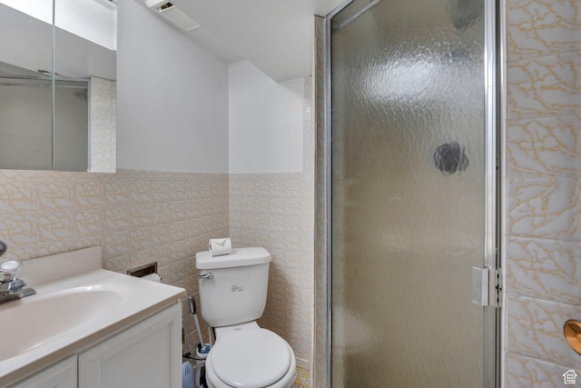 2040 N Oakcrest Ter, Provo, UT 84604 - full bath featuring vanity, a stall shower, and tile walls