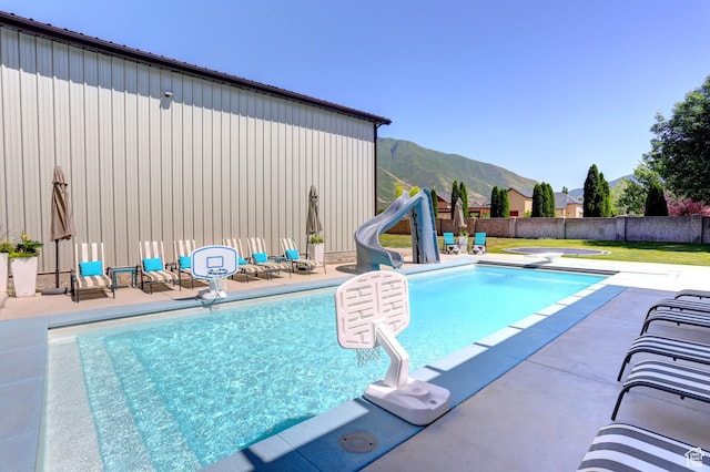 1767 S 800 W, Mapleton, UT 84664 - view of pool featuring a water slide, a mountain view, a fenced backyard, and a patio