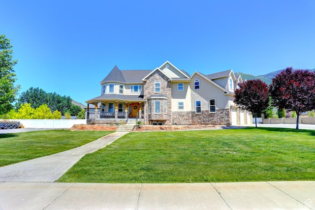 1767 S 800 W, Mapleton, UT 84664 - view of front of property featuring stone siding, covered porch, and stucco siding