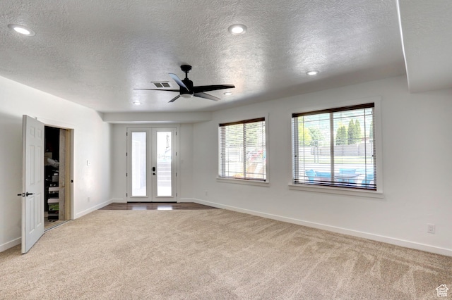 1767 S 800 W, Mapleton, UT 84664 - carpeted empty room featuring a textured ceiling, recessed lighting, a ceiling fan, and french doors