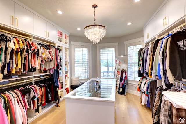 1767 S 800 W, Mapleton, UT 84664 - spacious closet with light wood finished floors and a chandelier