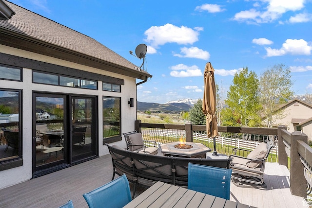 4555 Palomino Dr, Heber City, UT 84032 - deck with a fire pit and a mountain view