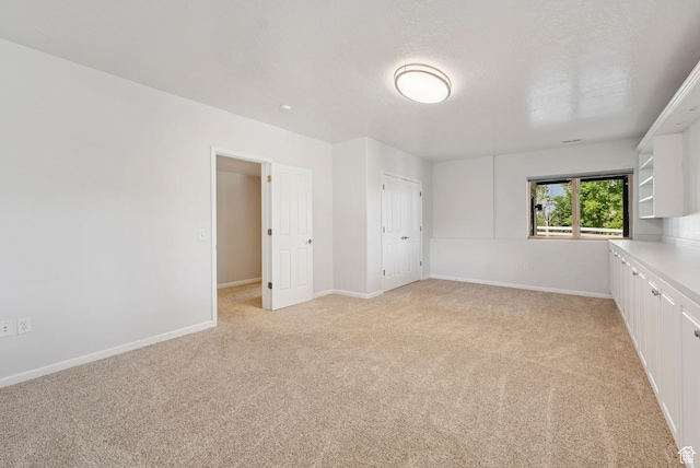 4555 Palomino Dr, Heber City, UT 84032 - unfurnished bedroom with light carpet and baseboards