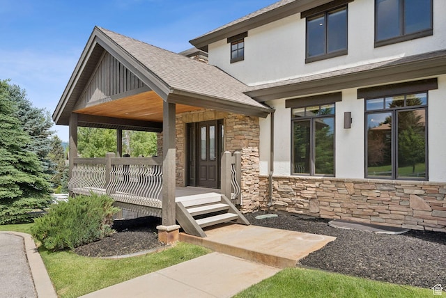 4555 Palomino Dr, Heber City, UT 84032 - view of front of property with stone siding, stucco siding, a shingled roof, and covered porch