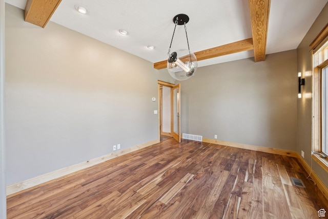 4555 Palomino Dr, Heber City, UT 84032 - unfurnished room with beamed ceiling, wood finished floors, and recessed lighting