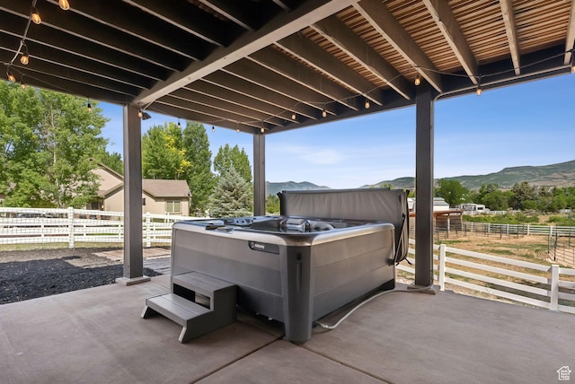 4555 Palomino Dr, Heber City, UT 84032 - view of patio / terrace with a mountain view and a hot tub