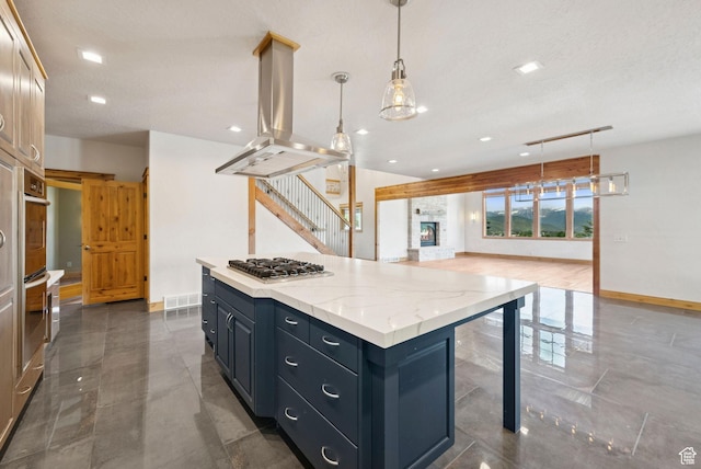 4555 Palomino Dr, Heber City, UT 84032 - kitchen featuring island range hood, stainless steel gas cooktop, open floor plan, a kitchen island, and recessed lighting