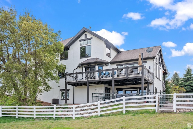 4555 Palomino Dr, Heber City, UT 84032 - view of front of house with stucco siding, a deck, and roof with shingles
