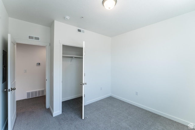 8333 S Iris Lumi Ln W Unit Q304, Midvale, UT 84047 - unfurnished bedroom featuring carpet floors and a closet