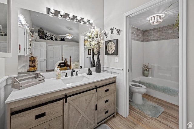 1343 W 870 N, Pleasant Grove, UT 84062 - bathroom featuring wood finished floors, vanity, a ceiling fan, and tub / shower combination