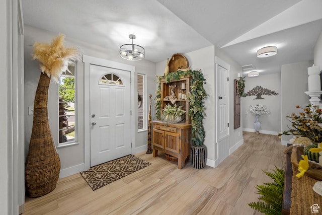 1343 W 870 N, Pleasant Grove, UT 84062 - entrance foyer with light wood finished floors and a chandelier
