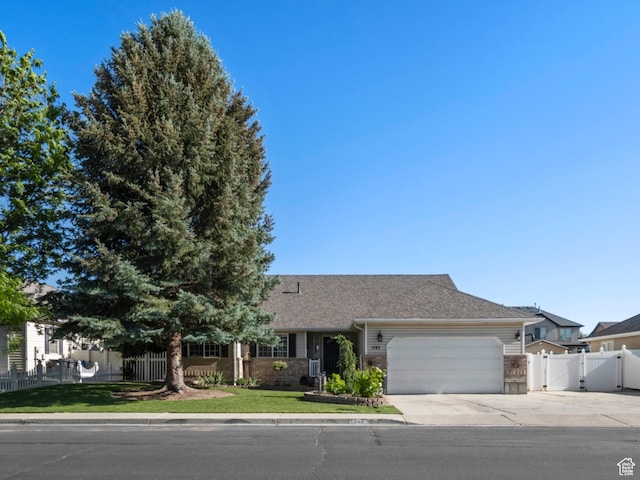 1343 W 870 N, Pleasant Grove, UT 84062 - ranch-style home featuring a garage, concrete driveway, a gate, and a shingled roof