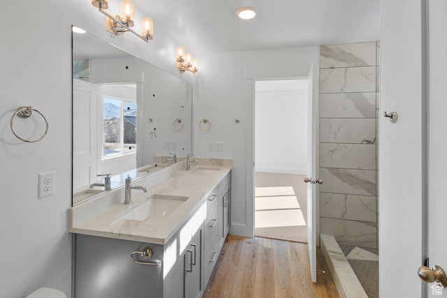 167 N 950 E Unit 30, Tremonton, UT 84337 - full bath featuring double vanity, wood finished floors, a shower, and a chandelier