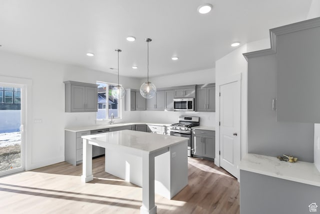167 N 950 E Unit 30, Tremonton, UT 84337 - kitchen featuring stainless steel appliances, gray cabinetry, healthy amount of natural light, and recessed lighting