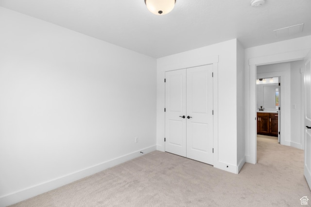 167 N 950 E Unit 30, Tremonton, UT 84337 - unfurnished bedroom featuring light carpet and a closet