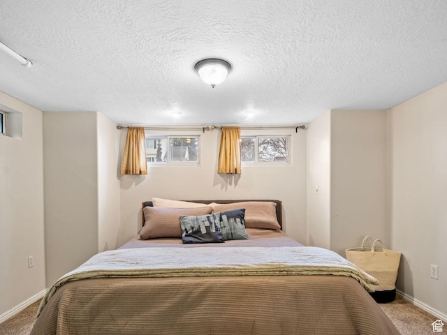 1728 E 27th St, Ogden, UT 84403 - bedroom with carpet flooring and a textured ceiling