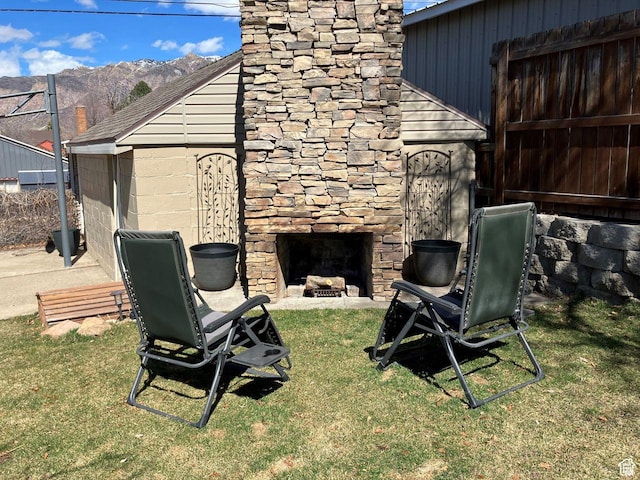 1728 E 27th St, Ogden, UT 84403 - view of yard featuring an outdoor stone fireplace