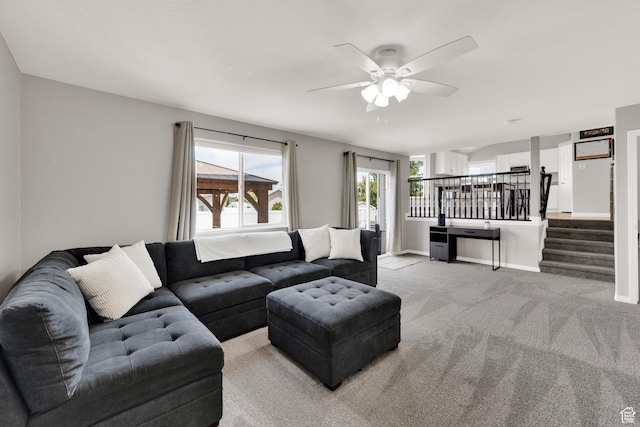 6470 S Wakefield Way, Salt Lake City, UT 84118 - living area with ceiling fan, light carpet, and stairs