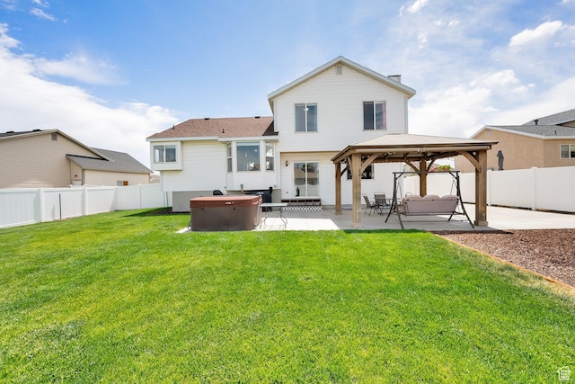 6470 S Wakefield Way, Salt Lake City, UT 84118 - rear view of property featuring a hot tub, a gazebo, a patio, and a fenced backyard