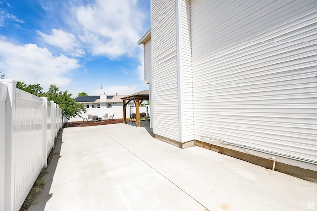 6470 S Wakefield Way, Salt Lake City, UT 84118 - fenced backyard with a gazebo and a patio area