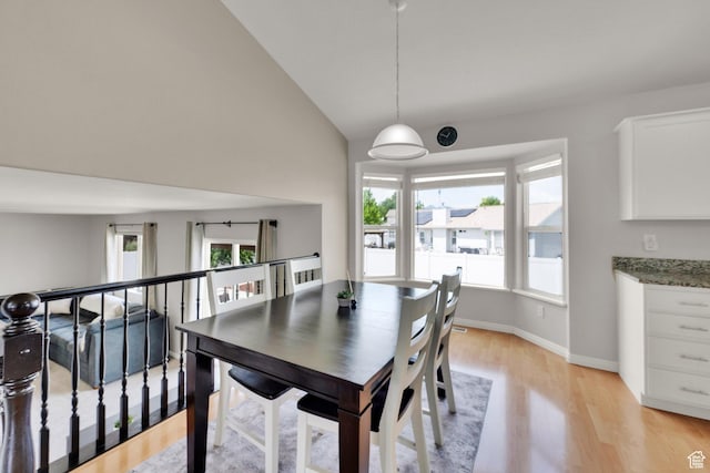 6470 S Wakefield Way, Salt Lake City, UT 84118 - dining space featuring light wood-style floors and lofted ceiling