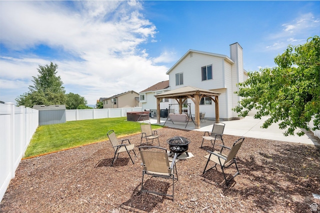 6470 S Wakefield Way, Salt Lake City, UT 84118 - back of house featuring a fire pit, a gazebo, a patio, a chimney, and a fenced backyard