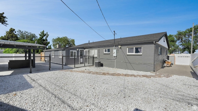 5356 S 4280 W, Salt Lake City, UT 84118 - rear view of house featuring a gate, a patio area, and brick siding