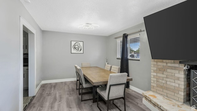5356 S 4280 W, Salt Lake City, UT 84118 - dining space with wood finished floors and a textured ceiling