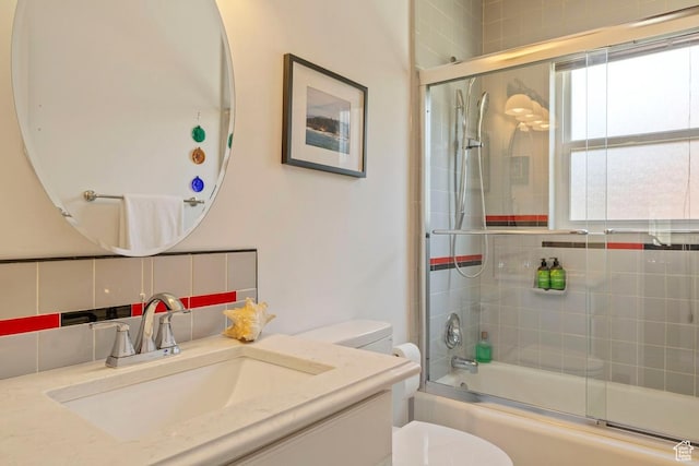 2664 S Melbourne St E, Salt Lake City, UT 84106 - full bathroom with vanity and shower / bath combination with glass door