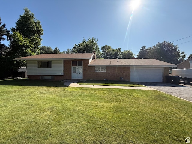 48 S Flint St, Kaysville, UT 84037 - view of front of property with brick siding, concrete driveway, an attached garage, and a front lawn
