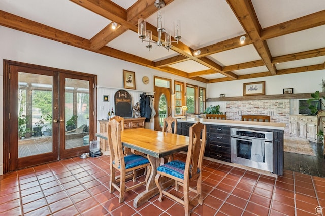 455 E Boulderville Rd, Oakley, UT 84055 - dining area featuring french doors, coffered ceiling, dark tile patterned flooring, beam ceiling, and a chandelier