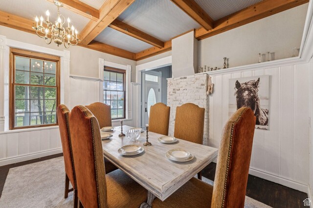 455 E Boulderville Rd, Oakley, UT 84055 - dining space with wood finished floors, beamed ceiling, a chandelier, a decorative wall, and coffered ceiling