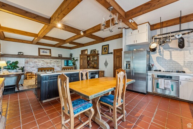455 E Boulderville Rd, Oakley, UT 84055 - dining area with dark tile patterned floors, beamed ceiling, and coffered ceiling
